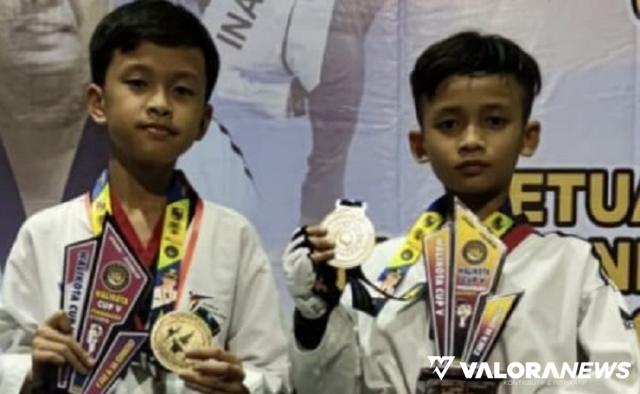 <p>Dua Taekwondoin Dojang Kodim 0304 Agam Raih Medali Emas<p>